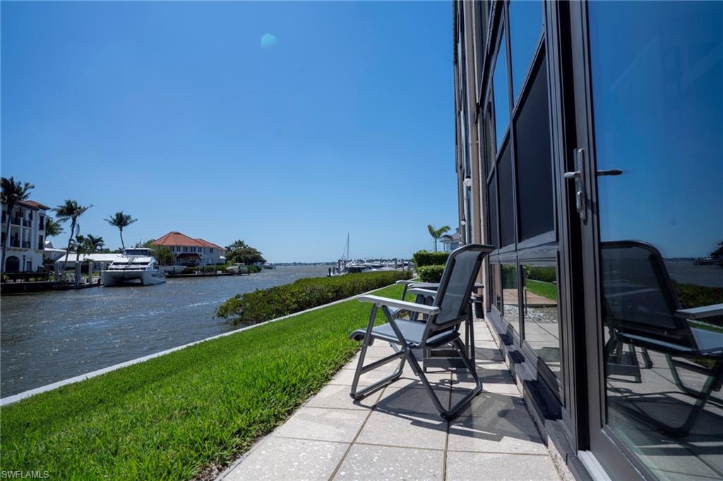 805 River Point Drive, Unit 103C Naples, FL 34102 - Photo 6 of 27 a view of yard with seating area and furniture