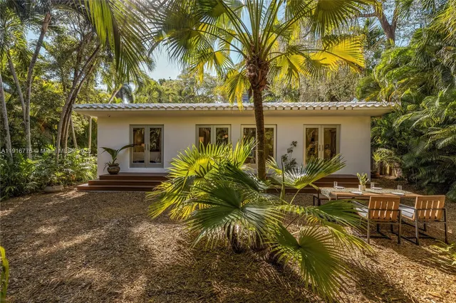 a bathroom with a sink vanity and a mirror