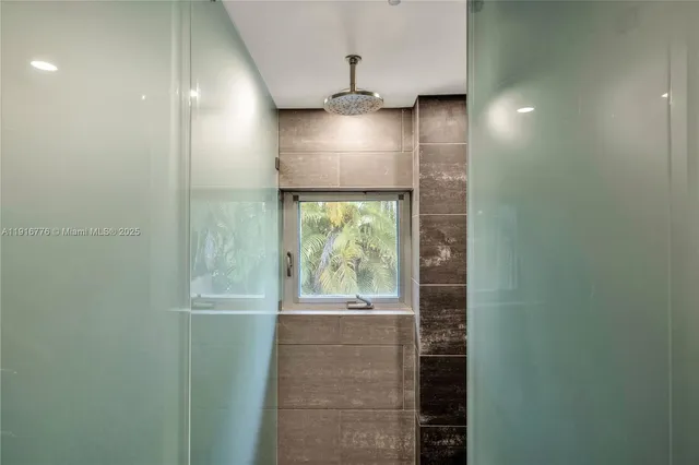 a view of balcony with wooden floor and fence