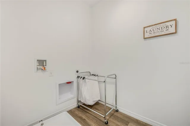 a view of a room with rack on the wall