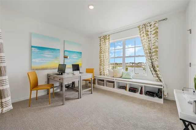 a view of a dining room with furniture window and outside view