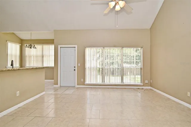a kitchen with a sink stove and refrigerator