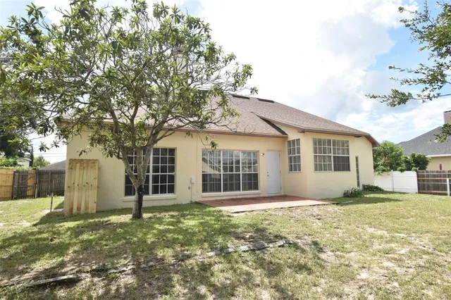 a house view with a garden space