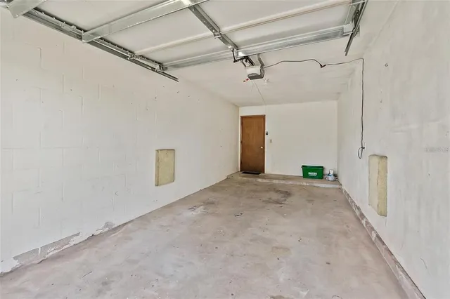 a view of a room with a glass door and shower