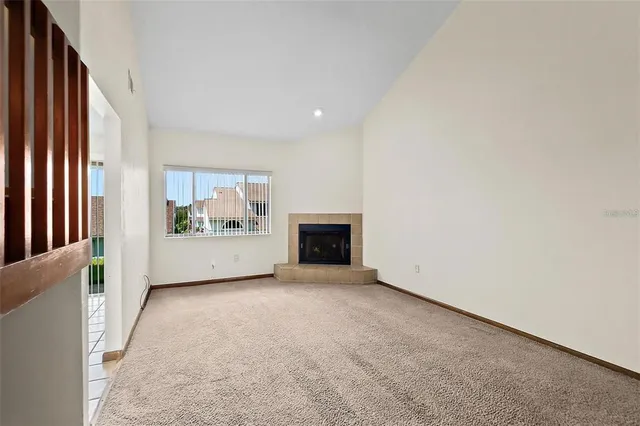 a kitchen with a stove a sink and a refrigerator