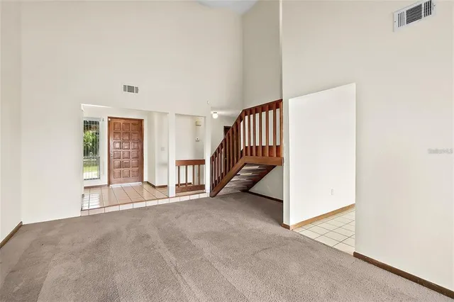 a kitchen with stainless steel appliances a sink and cabinets