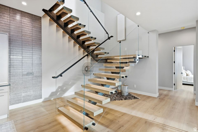 2002 East Outlaw Road Kamas, UT 84036 - Photo 43 of 65 Modern floating staircase featuring natural wood treads and glass railings