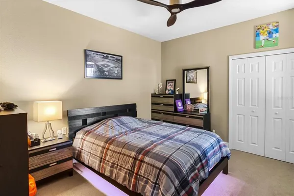 a bedroom with furniture and a bed