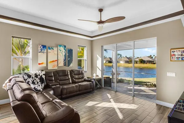a view of swimming pool with outdoor seating