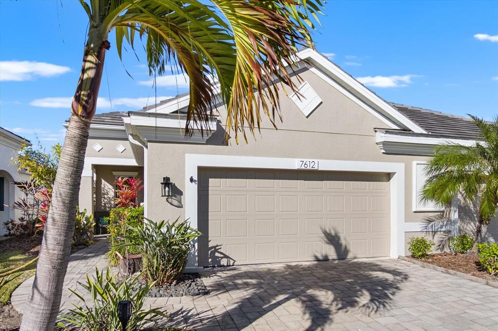 7612 Alumni Trail Sarasota, FL 34243 - Photo 8 of 35 a view of a house with a small yard