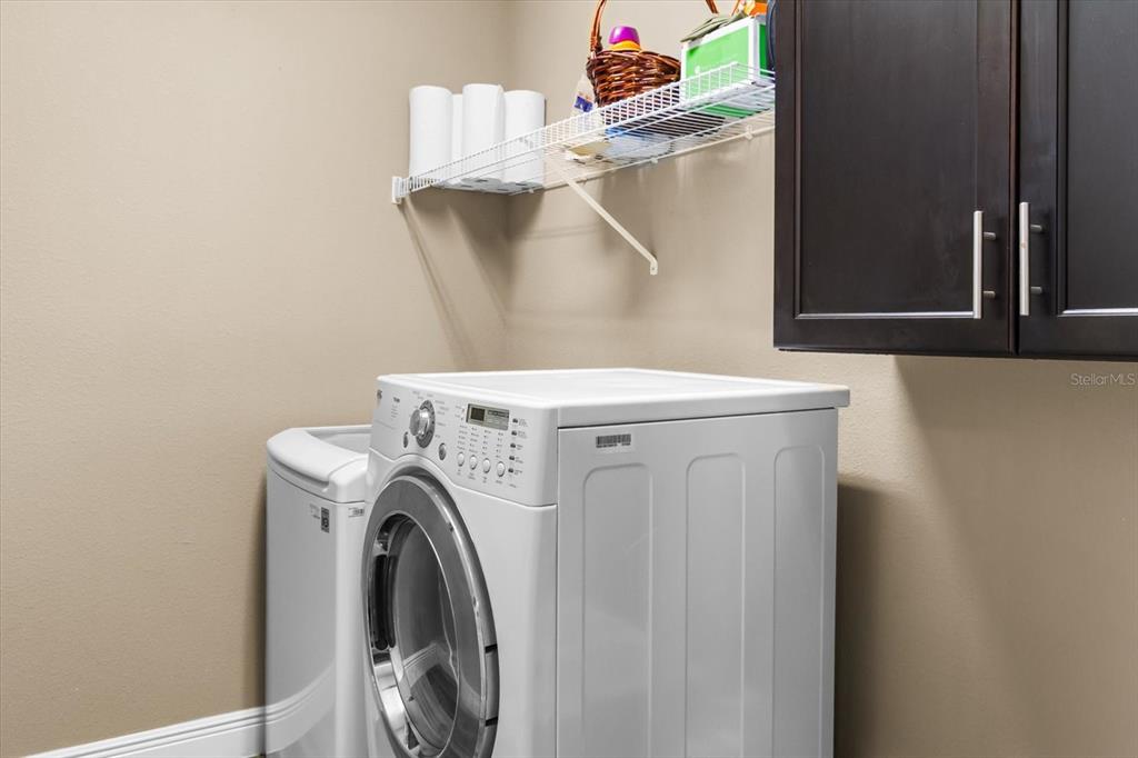 7612 Alumni Trail Sarasota, FL 34243 - Photo 10 of 35 a utility room with dryer and washer
