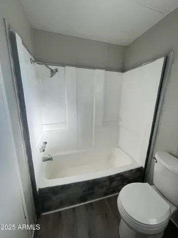 a utility room with sink dryer and washer