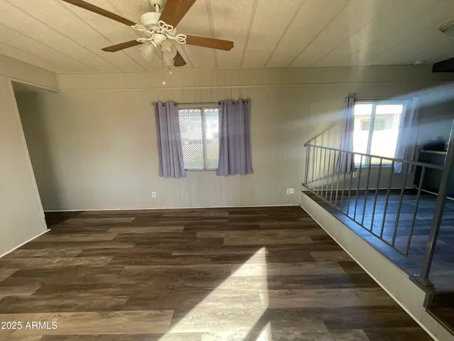 a view of a living room with a hardwood floor