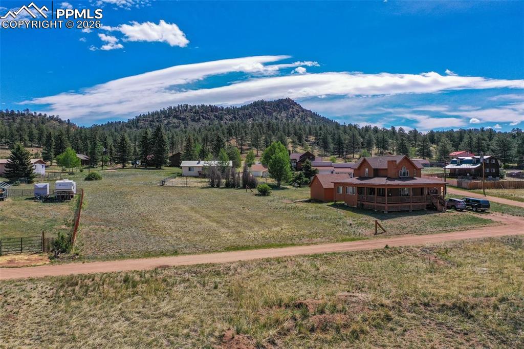 128 Osage Path Lake George, CO 80827 - Photo 4 of 15 a view of a backyard with sitting area