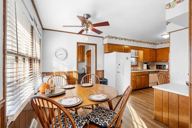 a very nice looking dining room with a table and chairs