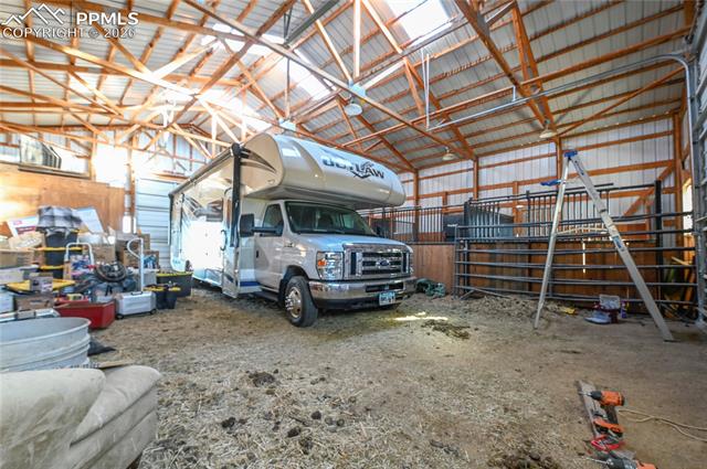16830 Finch Road Colorado Springs, CO 80928 - Photo 40 of 49 4-stall barn with power, water, space for an RV, and a tack room