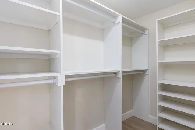 a view of an empty walk in closet