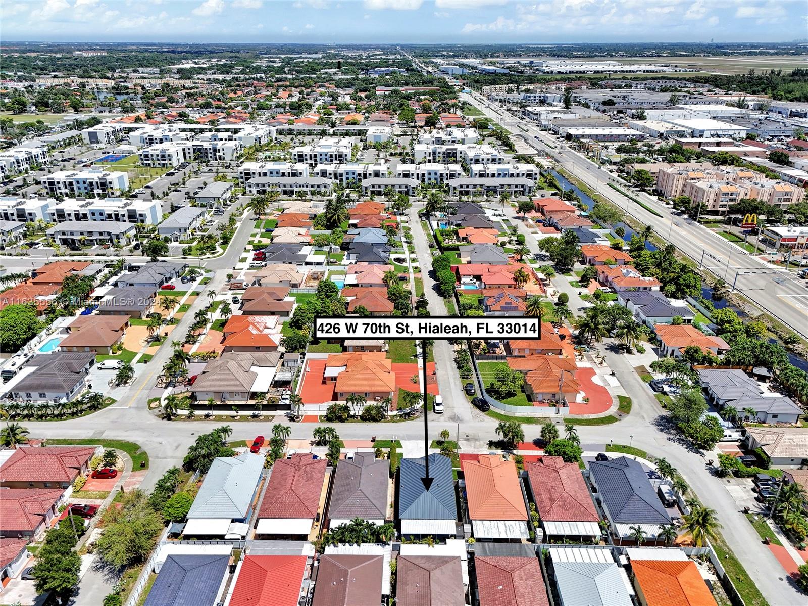 426 West 70th Street Hialeah, FL 33014 - Photo 24 of 26 an aerial view of a city