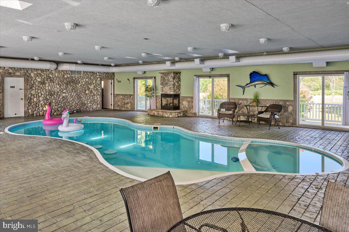 3533 State Rte 2012 Union Dale, PA 18470 - Photo 21 of 57 Indoor pool with lounge seating
