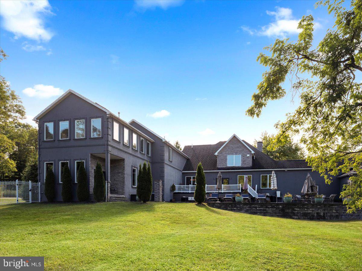 3533 State Rte 2012 Union Dale, PA 18470 - Photo 47 of 57 Rear exterior with lawn and covered loggia