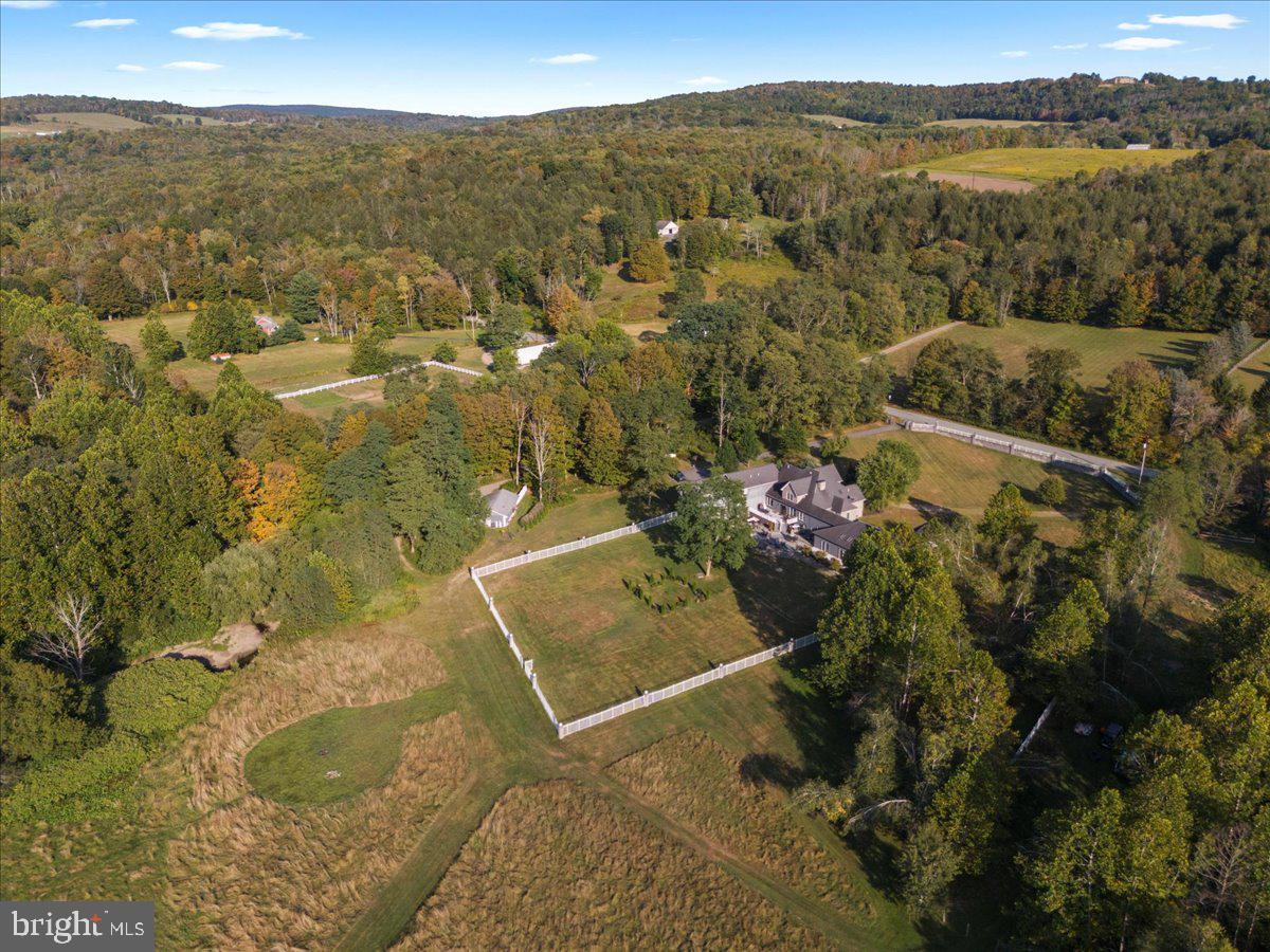 3533 State Rte 2012 Union Dale, PA 18470 - Photo 48 of 57 Aerial over estate, paddocks and rolling hills