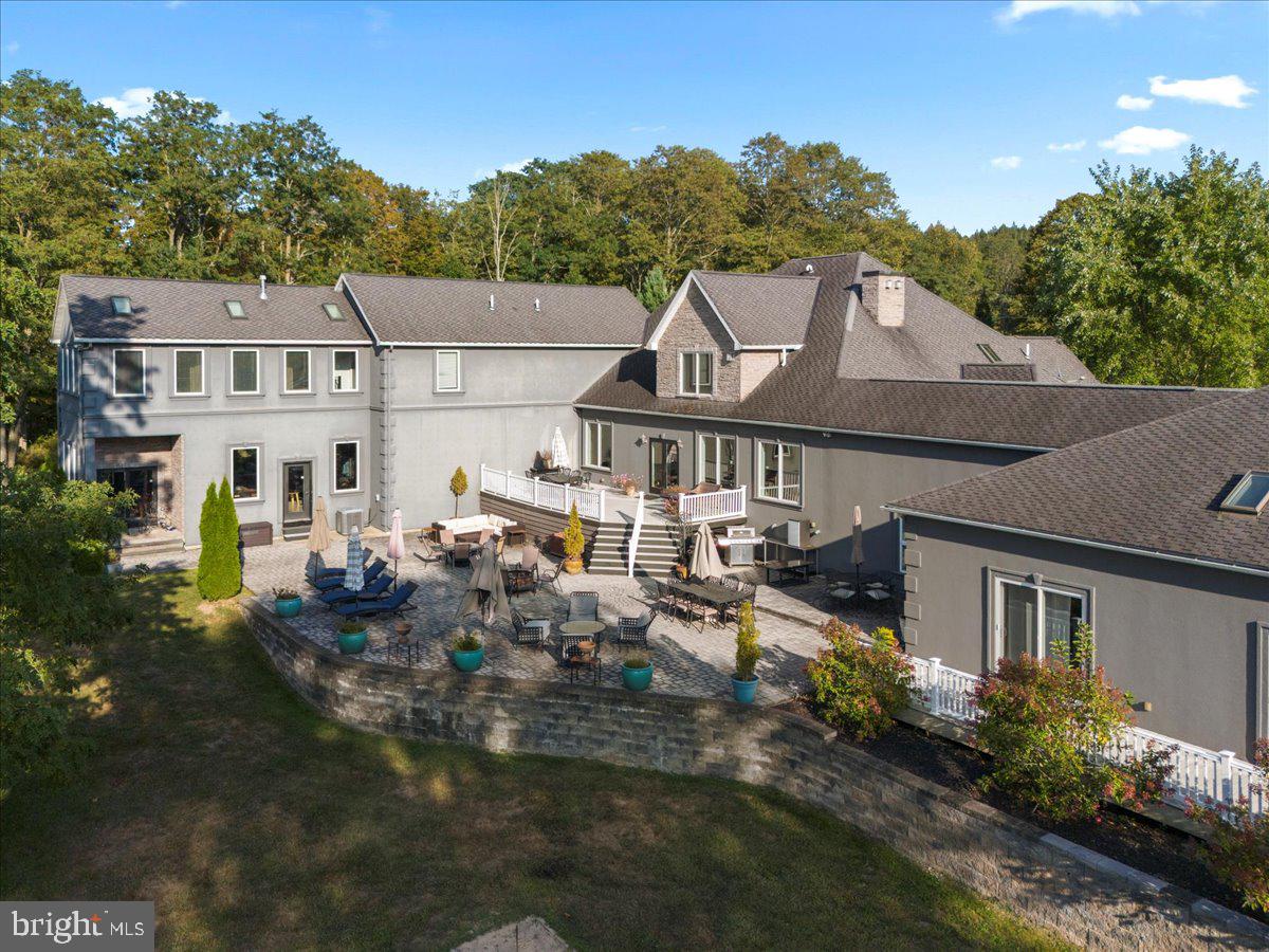 3533 State Rte 2012 Union Dale, PA 18470 - Photo 50 of 57 Back elevation with tiered entertaining terrace