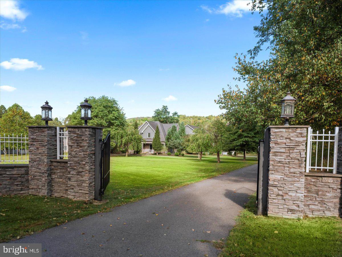 3533 State Rte 2012 Union Dale, PA 18470 - Photo 7 of 57 Gated entry with stone pillars