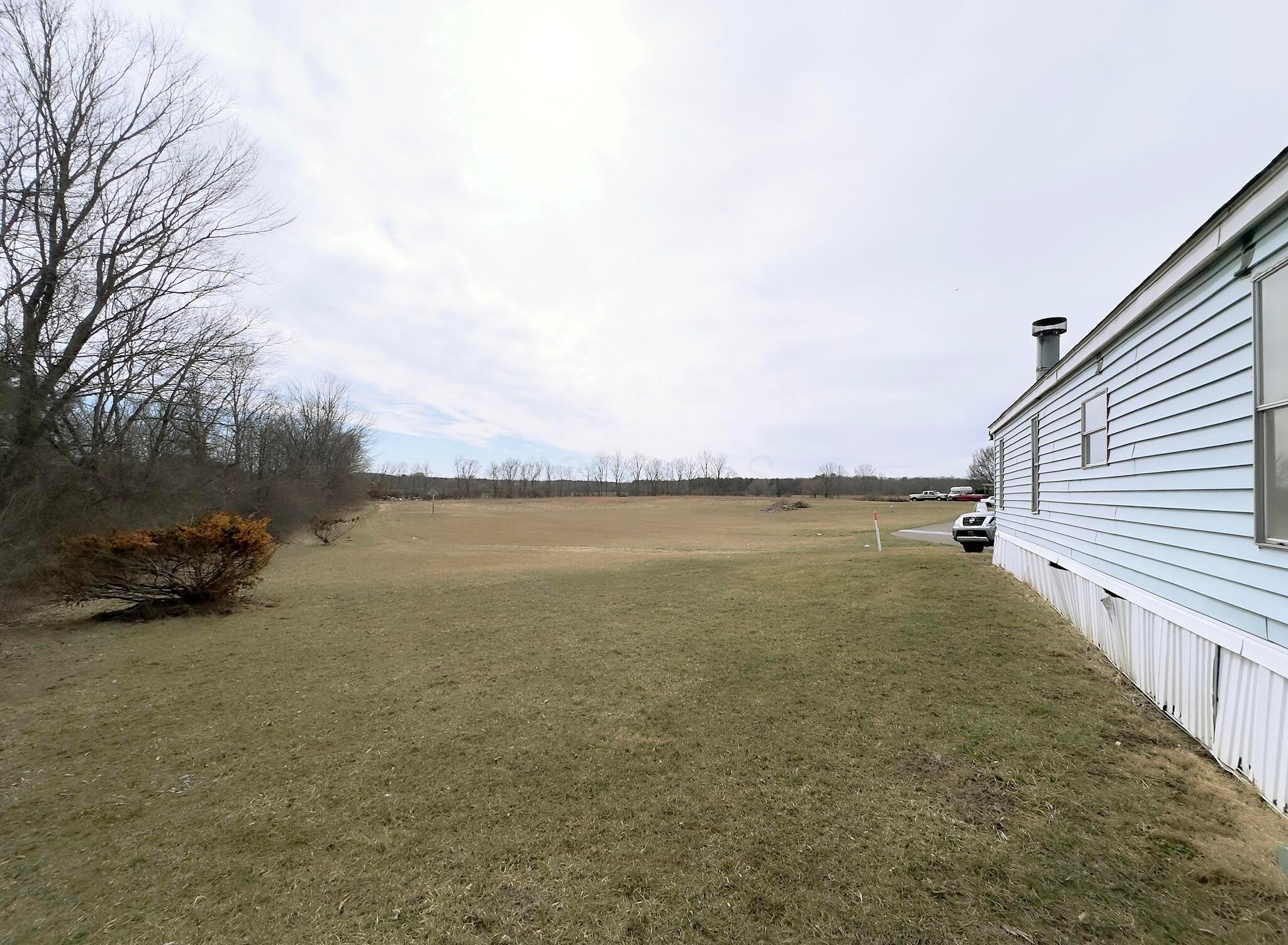 1330 Hanover Road, Unit 33 Delaware, OH 43015 - Photo 25 of 29 Side yard overlooking greenspace