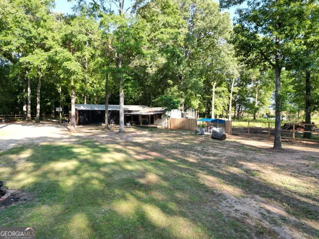 a view of a lake with a house