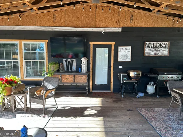 a view of a patio filled with furniture
