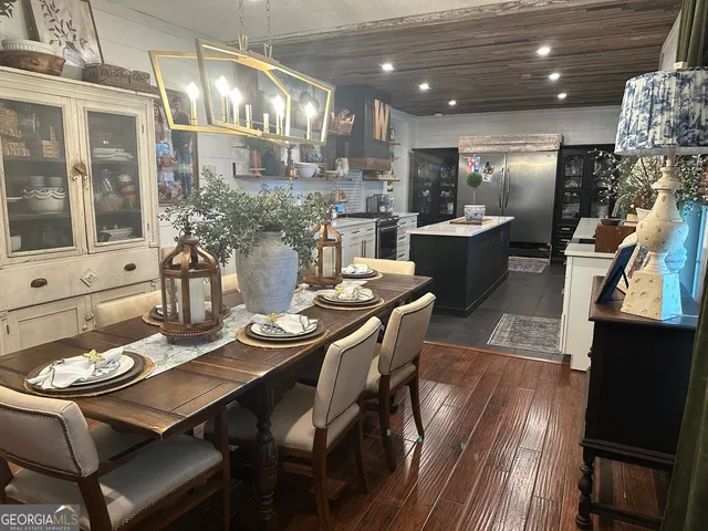 a large kitchen with lots of counter space and stainless steel appliances