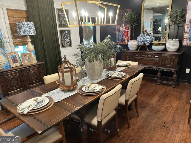 a kitchen with a sink a stove and cabinets