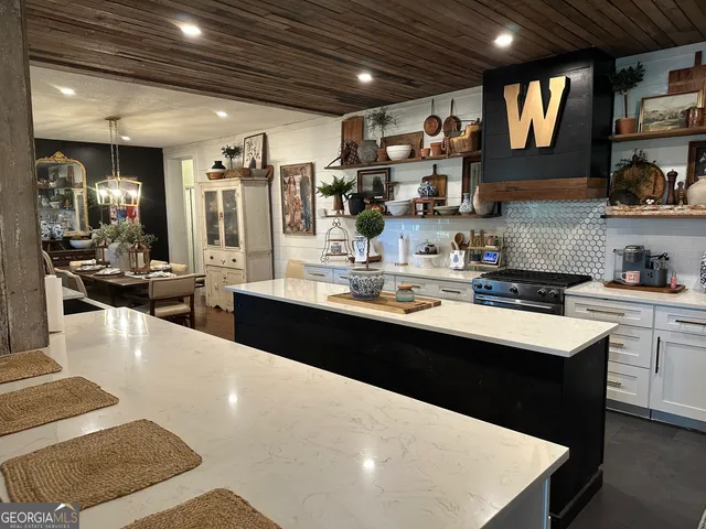 a view of staircase with furniture and rug