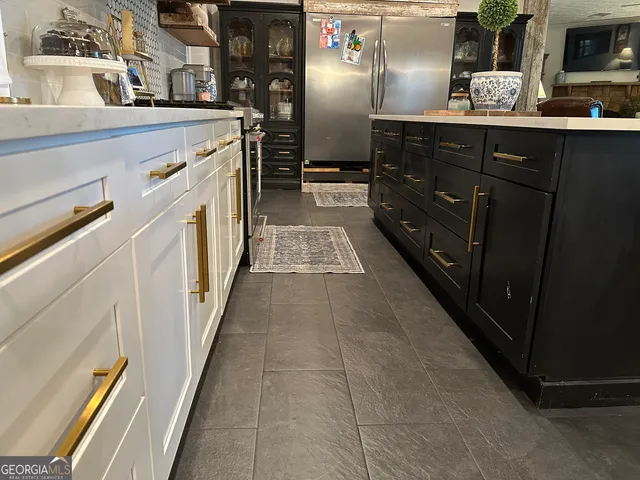 a living room with furniture fireplace and flat screen tv