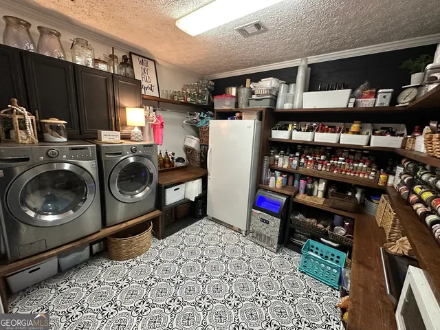 a bedroom with bed and wooden floor