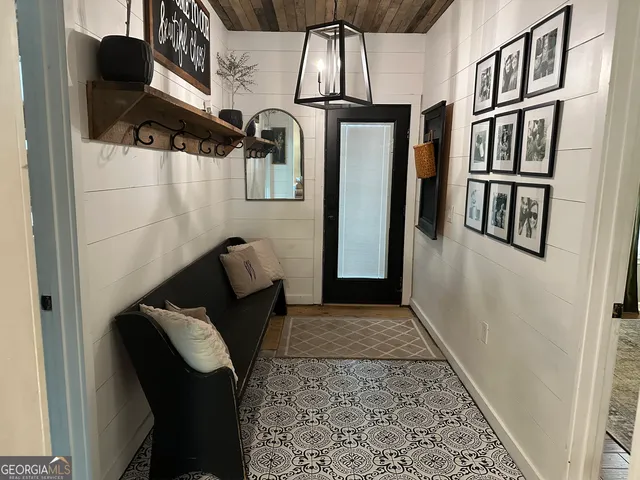 a bedroom with a bed and a fireplace