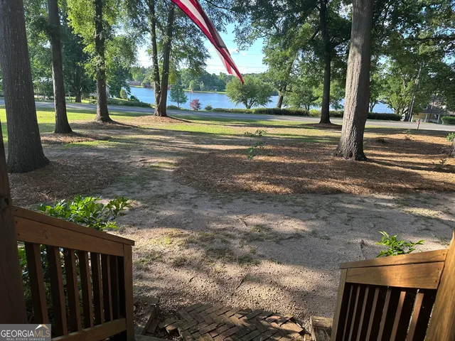 a view of a yard with a trees
