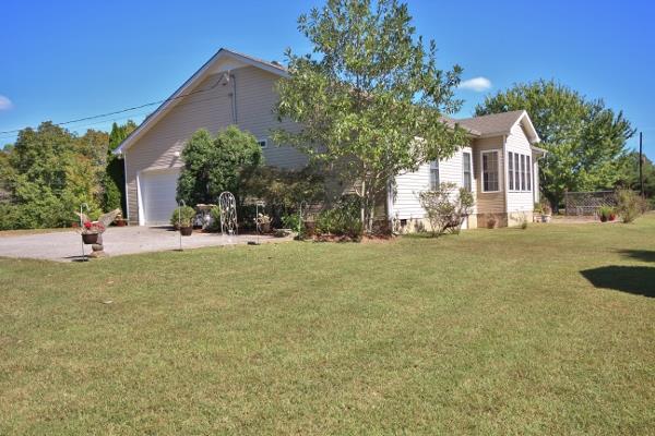 7506 King Road Fairview, TN 37062 - Photo 23 of 30 a front view of a house with a yard