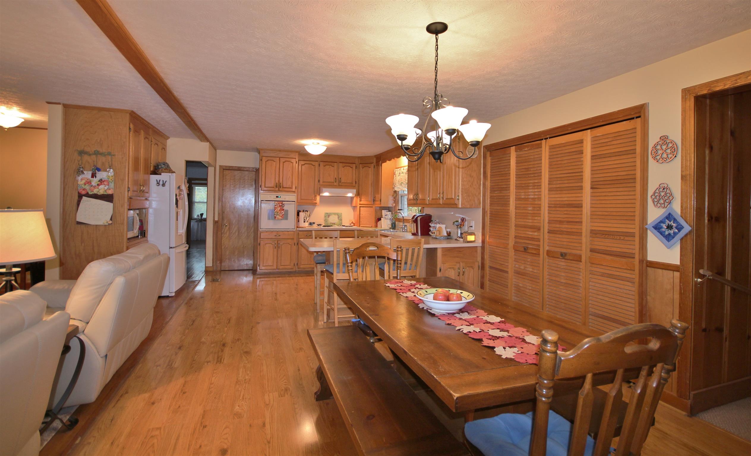 7506 King Road Fairview, TN 37062 - Photo 4 of 30 a view of a dining room with furniture and chandelier