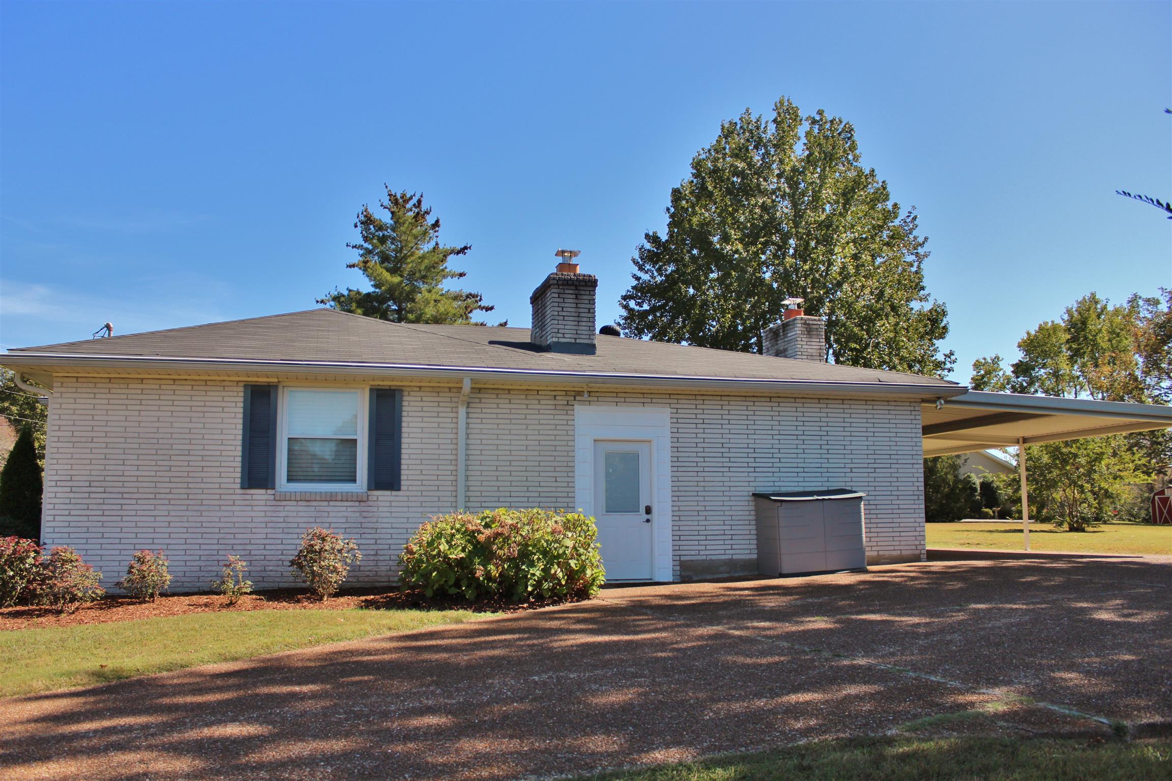 7506 King Road Fairview, TN 37062 - Photo 5 of 30 a front view of a house with a yard and garage
