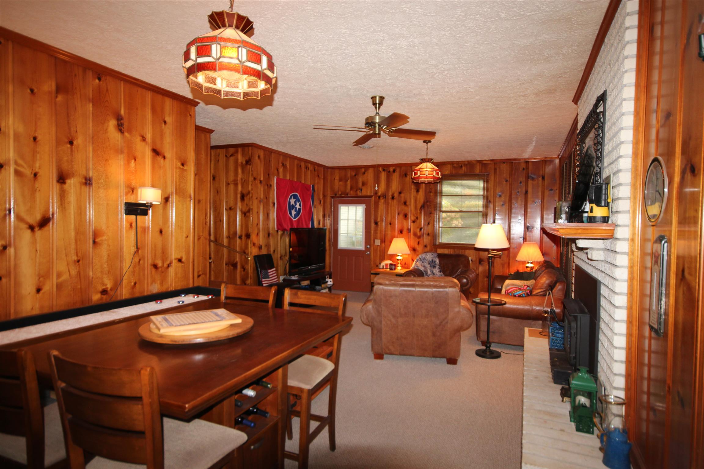 7506 King Road Fairview, TN 37062 - Photo 7 of 30 a view of a dining room with furniture and a chandelier