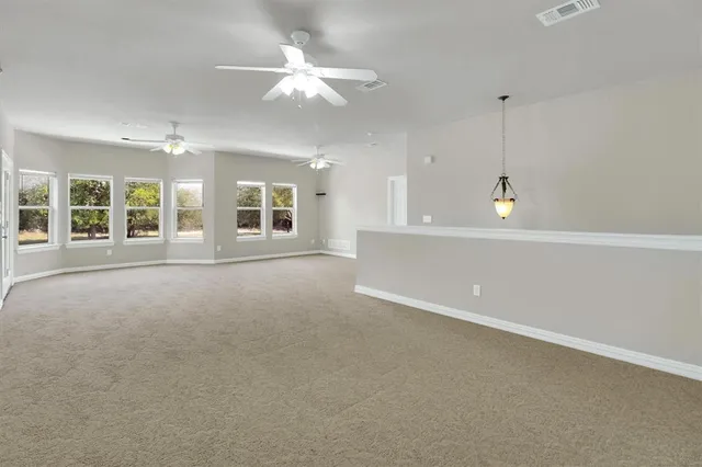 a view of a backyard with a lake view