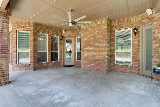 a view of empty room with a flat screen tv