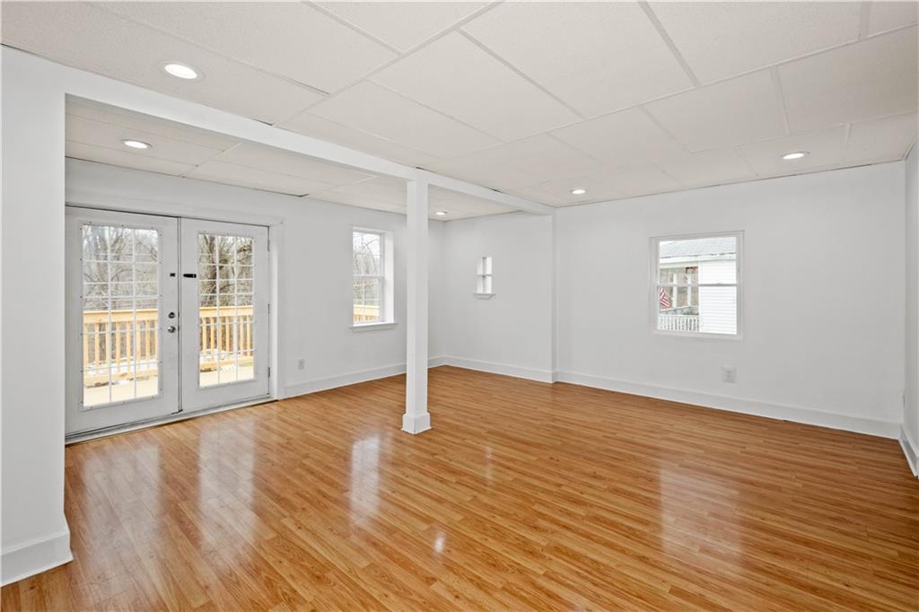 15 Maple Street Scenery Hill, PA 15360 - Photo 11 of 24 a view of an empty room with wooden floor and a window