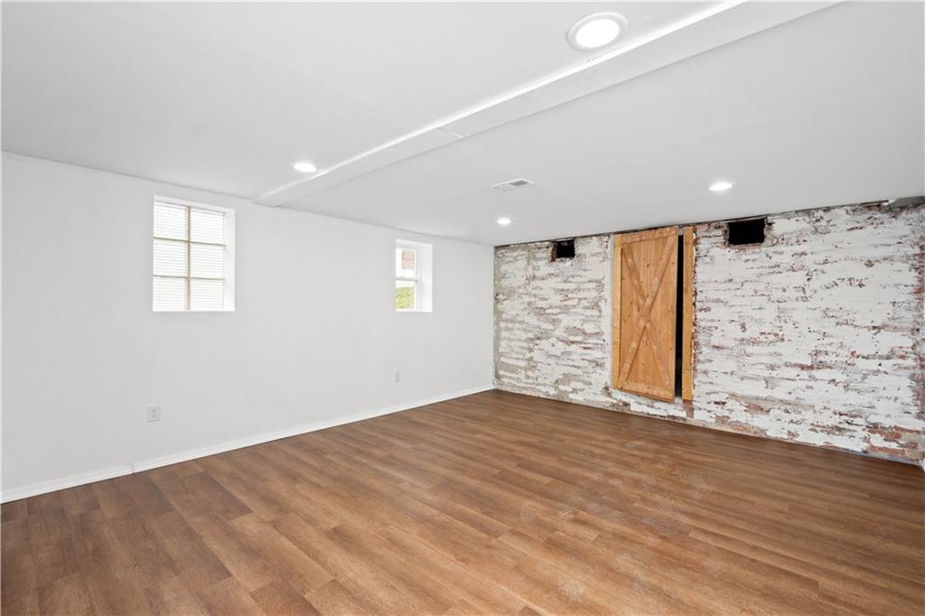 15 Maple Street Scenery Hill, PA 15360 - Photo 22 of 24 wooden floor in an empty room with a window