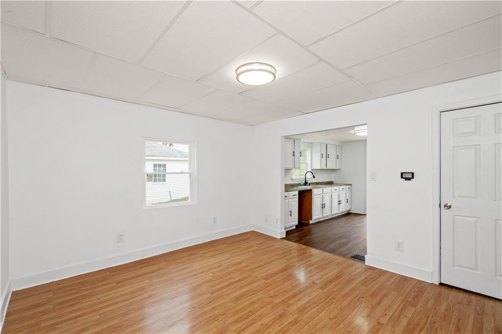 15 Maple Street Scenery Hill, PA 15360 - Photo 10 of 24 a view of a kitchen with wooden floor and a window