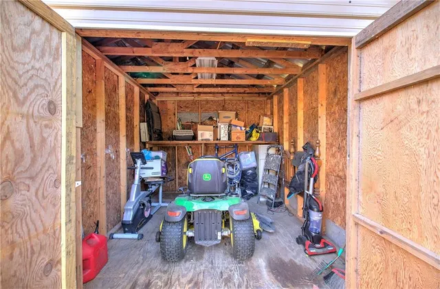 a dining room with furniture and a window
