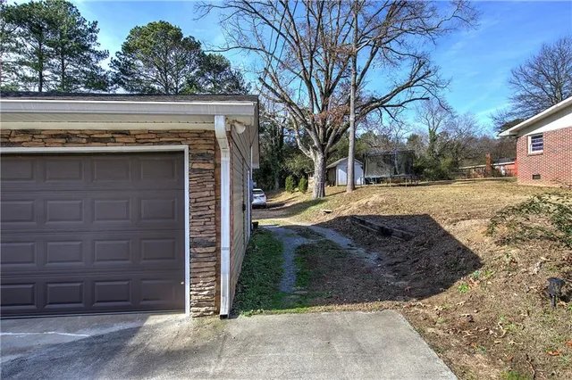 a view of entrance gate of a house