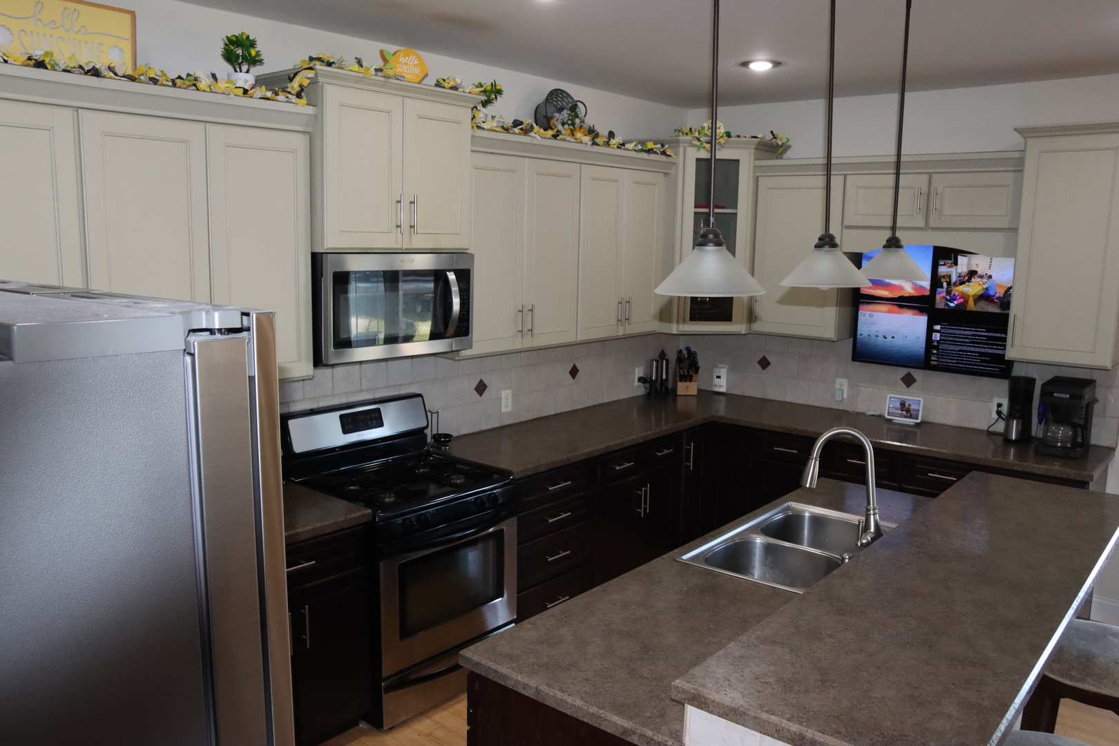 306 South 3rd Street Ashkum, IL 60911 - Photo 18 of 50 a kitchen with granite countertop a stove and a sink