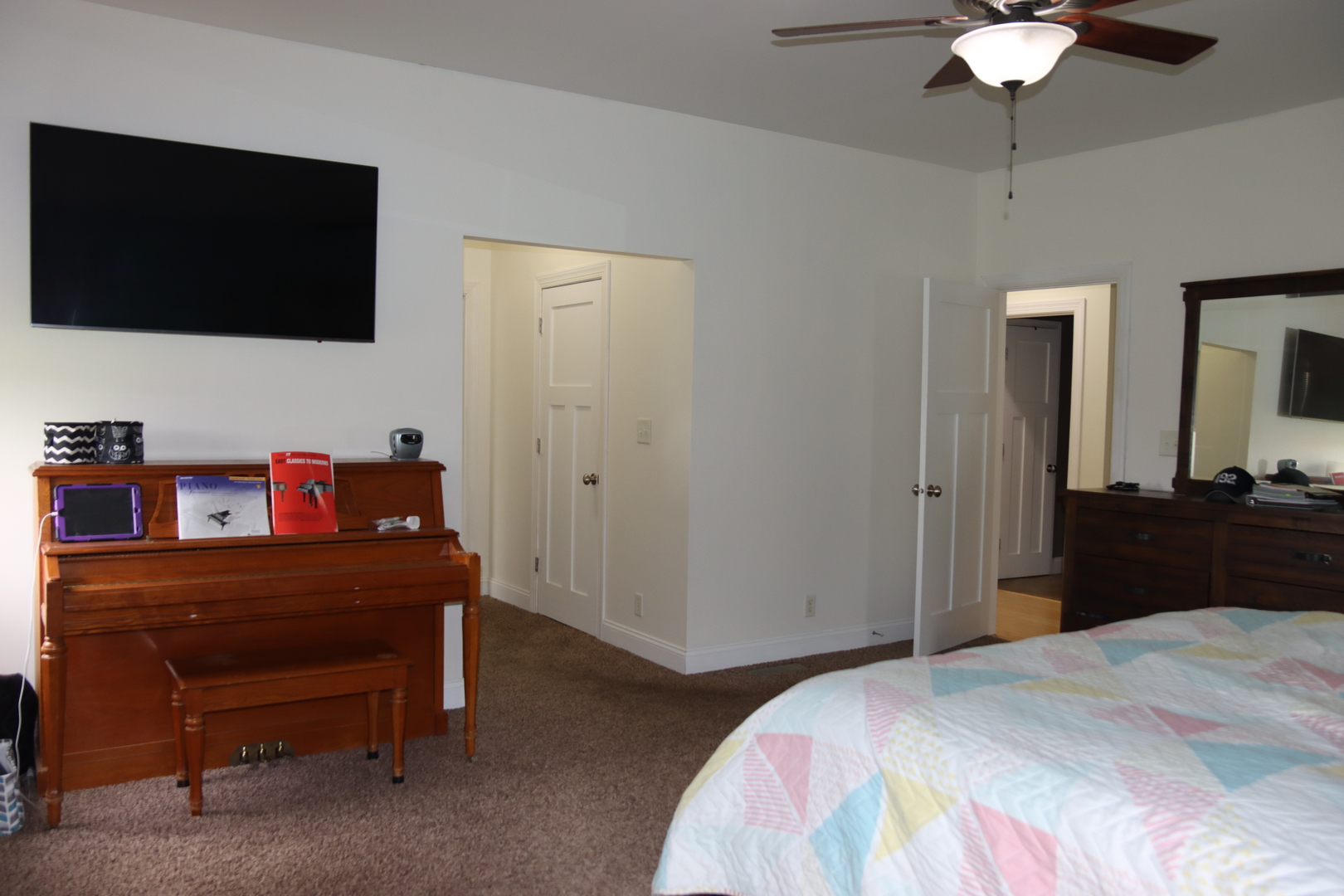 306 South 3rd Street Ashkum, IL 60911 - Photo 25 of 50 a bedroom with a bed and a flat screen tv